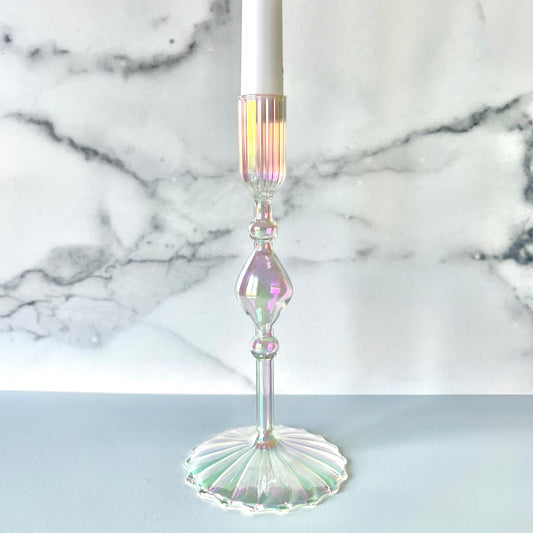 A close up of the Iridescent Candlestick on a white surface